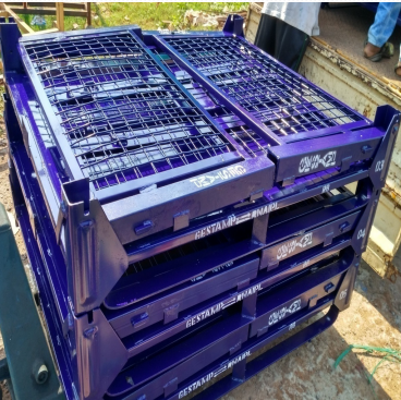 Steel component handling trolley for warehouse operations