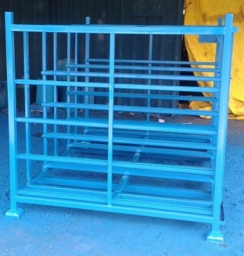 Steel component handling trolley for warehouse operations